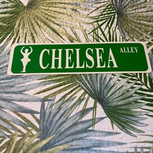 Green and white Chelsea Alley ballerina sign